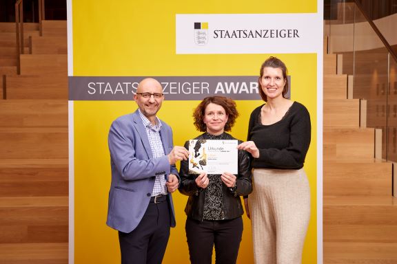 Platz 2, Stadt Karlsruhe mit 3 Vertretern des Projekts.